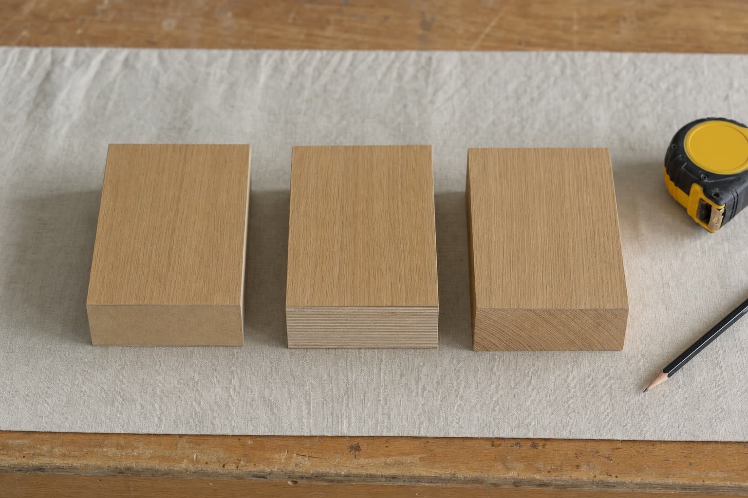 Cross-sections of furniture-grade MDF, birch plywood, and solid oak