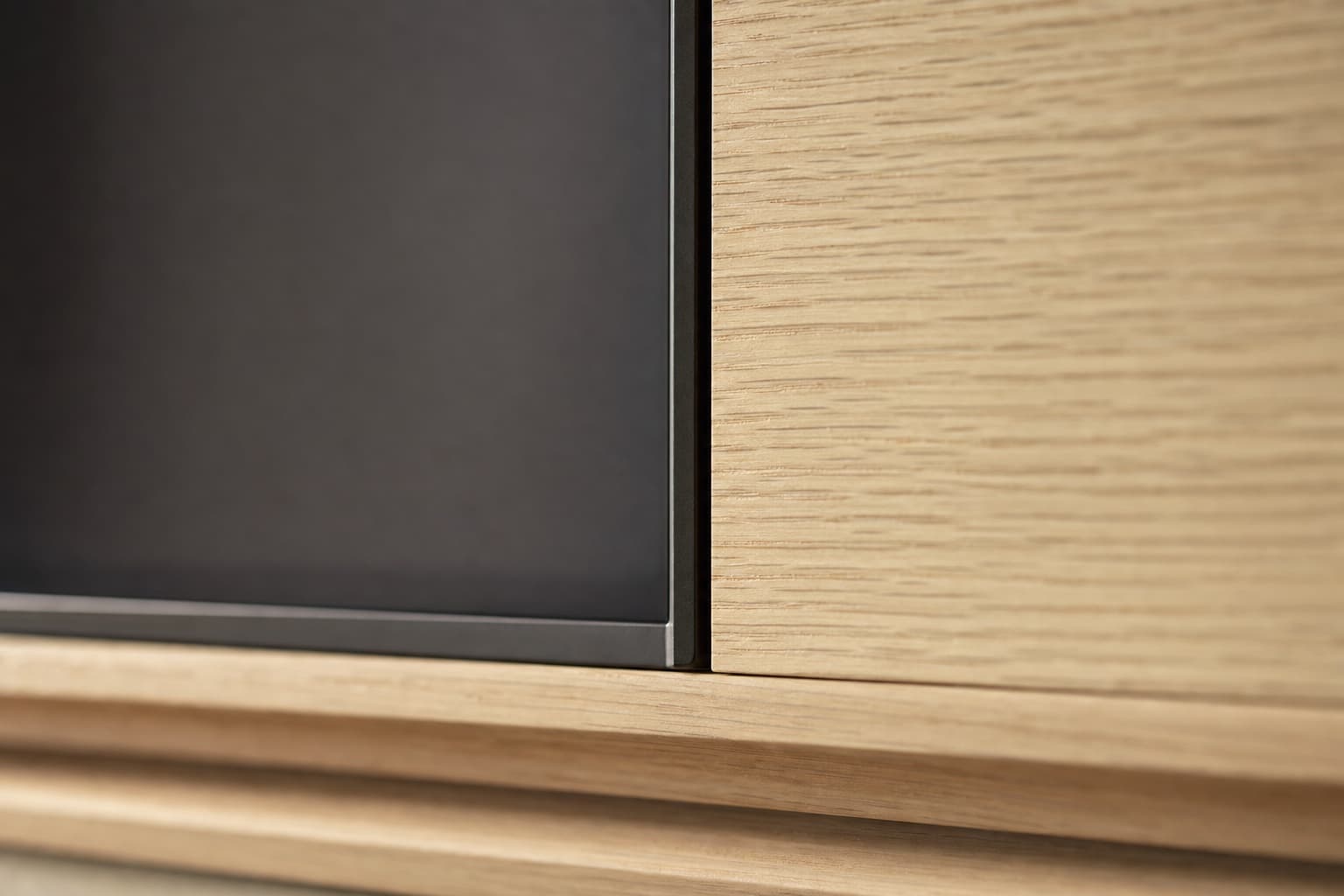 Comparison of 65, 75, and 85-inch televisions mounted on the same media wall